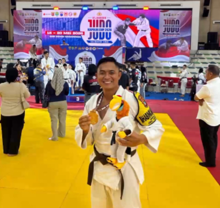 Brigpol M. Genza Anggrawan.SH berhasil meraih medali emas